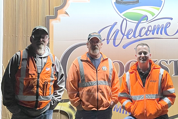 BNSF’s first bean harvest train of the season departed Crookston, Minnesota, at 1:45 a.m. on Tuesday, Sept. 12. Right to left: Division Trainmaster Robert Taylor, drove the crew, Locomotive Engineer Matt Fossum and Conductor Rob Sheppard, from Grand Forks, North Dakota, to Crookston to meet the train. 