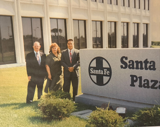 George Wong, right, pictured with his grandfather and grandmother on his first day of work at Santa Fe Plaza in Topeka, Kansas.