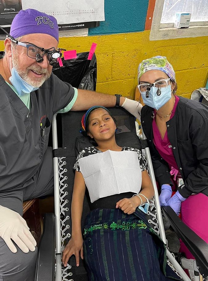Dr. Kenneth Kirkham does dental work for patients in Guatemala with Global Hands of Healing, which is supported by BNSF.