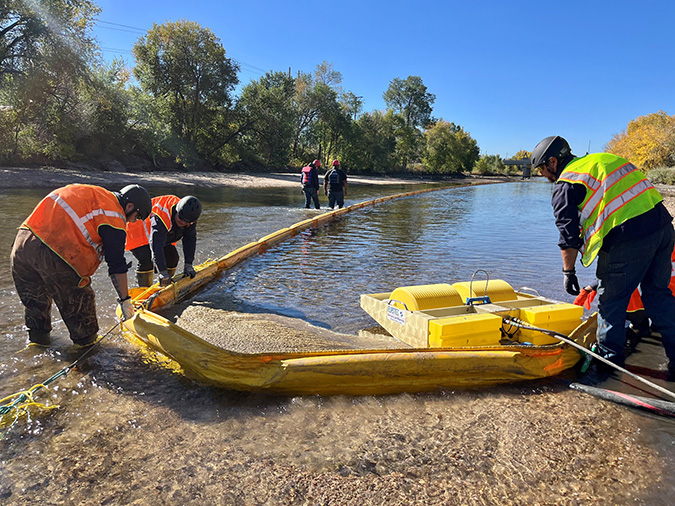 Hazmat training includes placement of booms on water. Hazmat training includes placement of booms on water.
